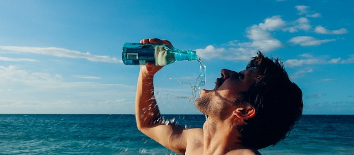 Drinking water on beach